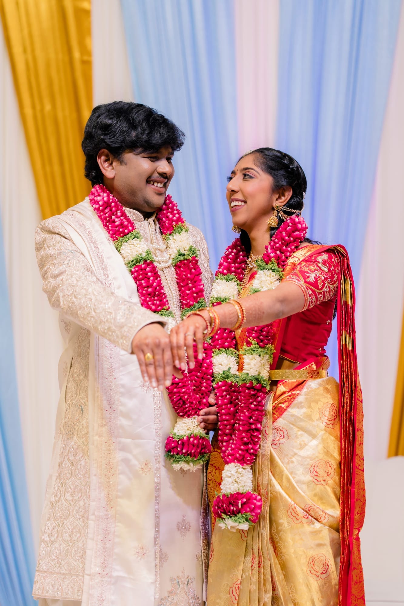 The couple, garlanded