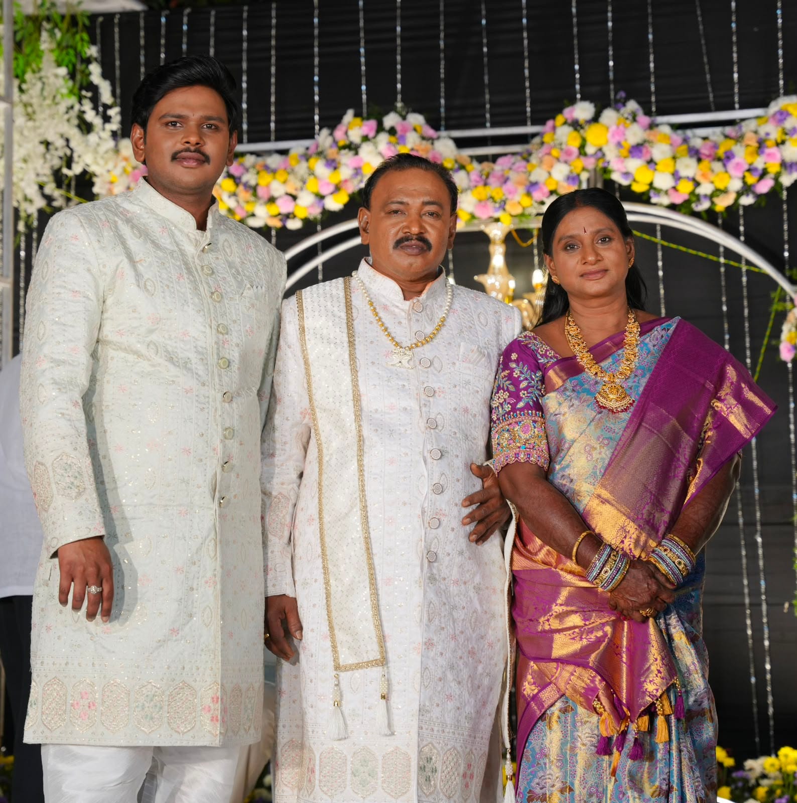 Sai with his parents
